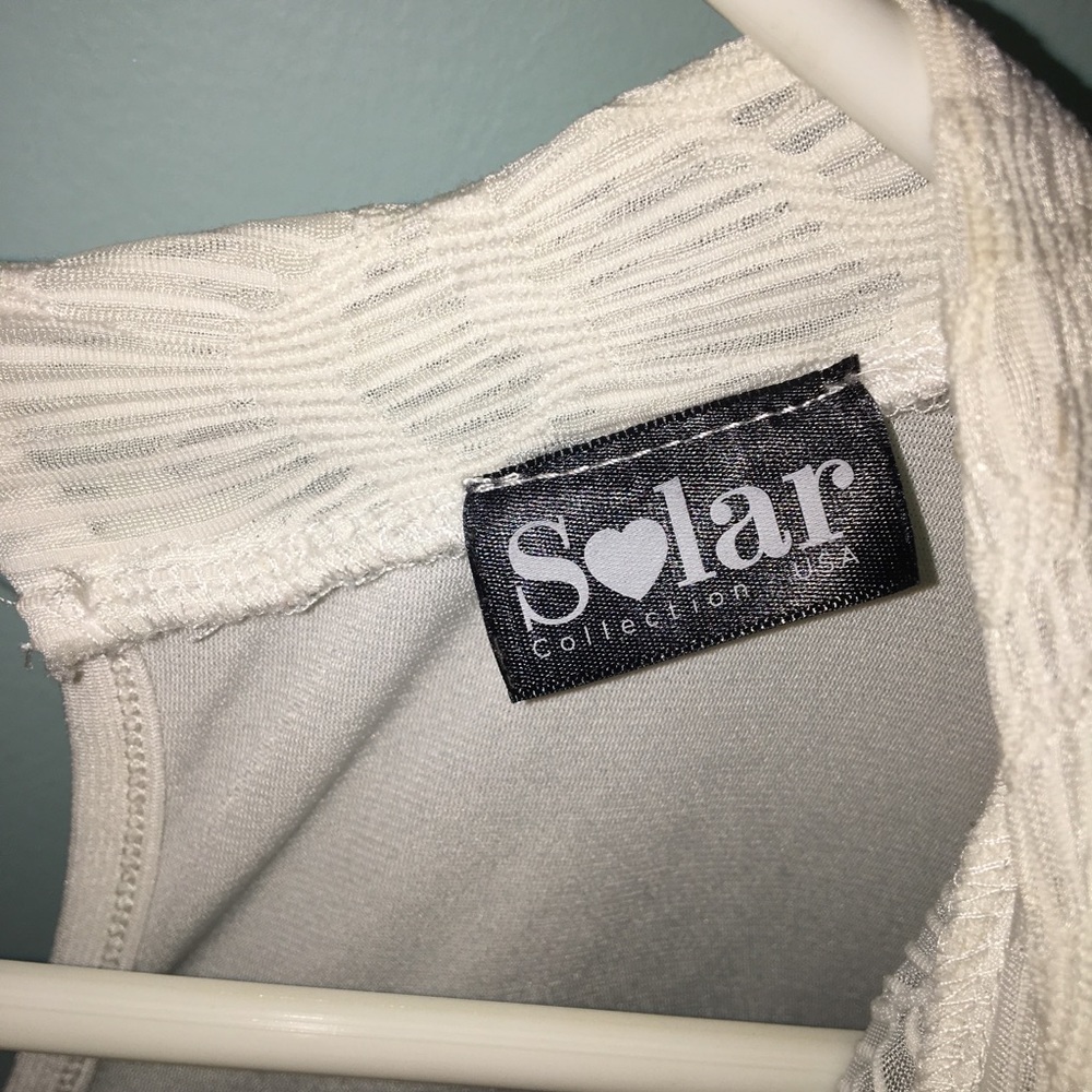 A white designed shirt